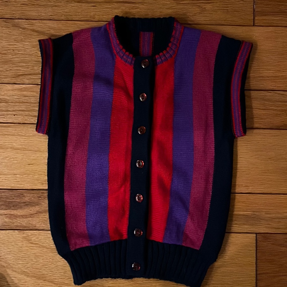 Bright colors. Great details. European knitted west for girls